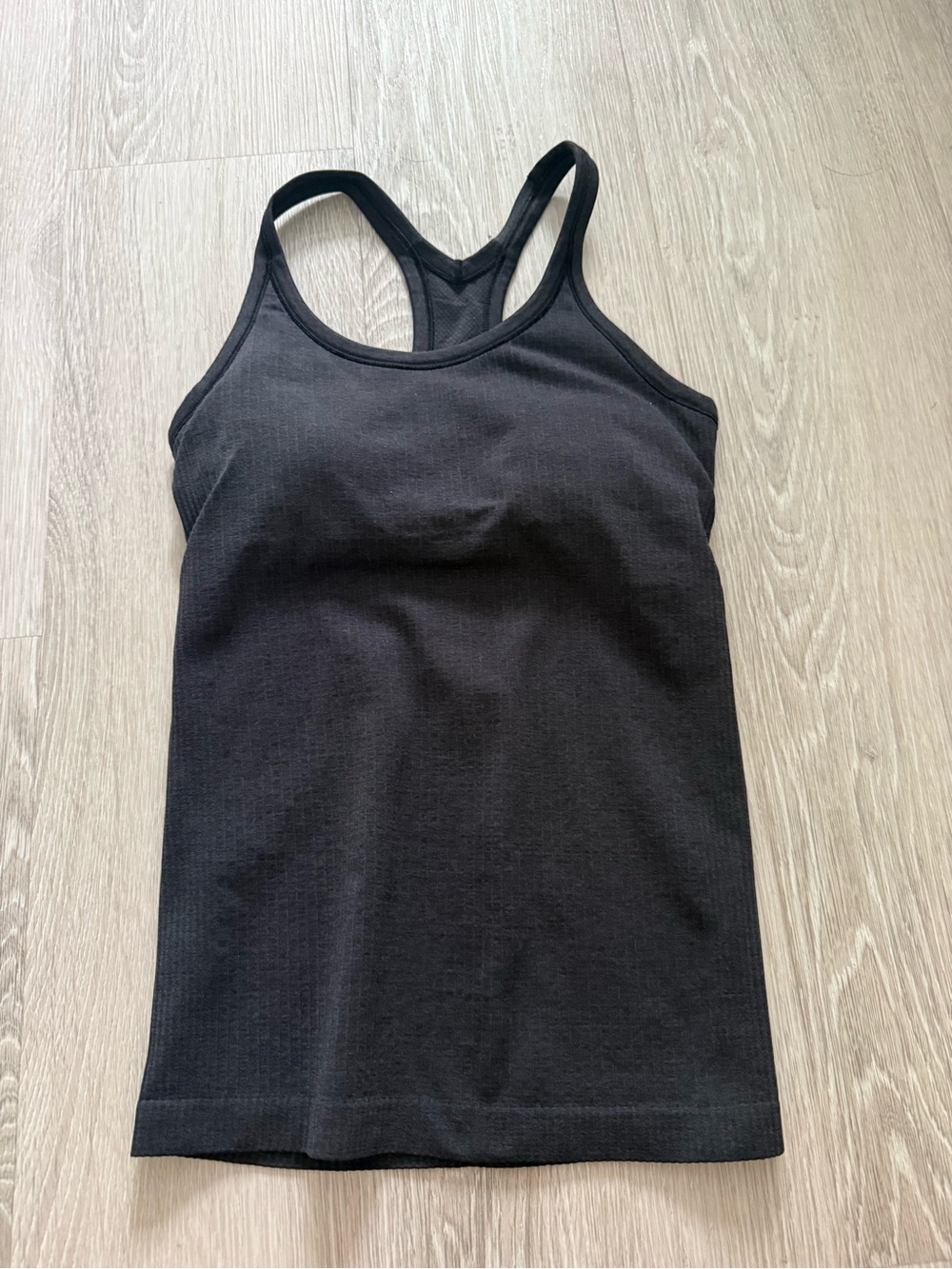 Lululemon ebb to street black tank size 4 EUC